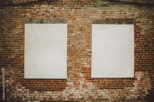 Old brick wall with two lar...