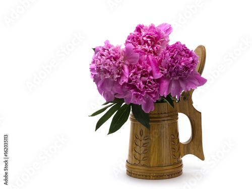 Fototapeta Naklejka Na Ścianę i Meble -  Beer mug with peonies isolated on white background. 