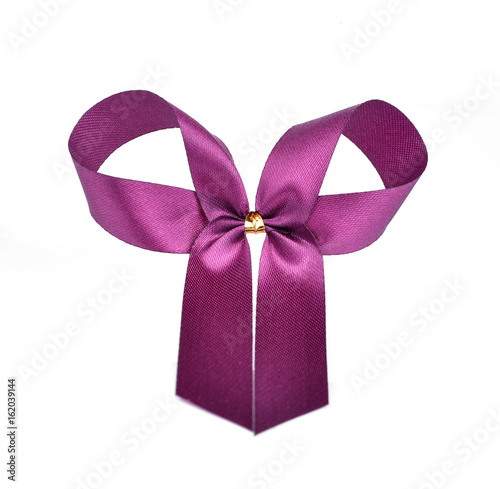 Purple bow isolated on white background
