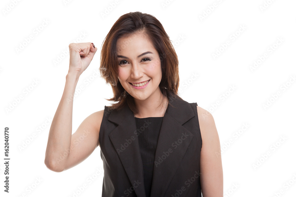Successful young Asian woman hold fist up. Successful young Asian woman hold fist up.