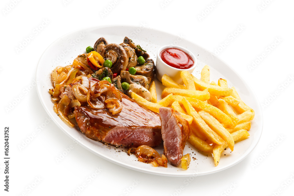 Grilled beef steak with french fries on white background Grilled beef steak with french fries on white background