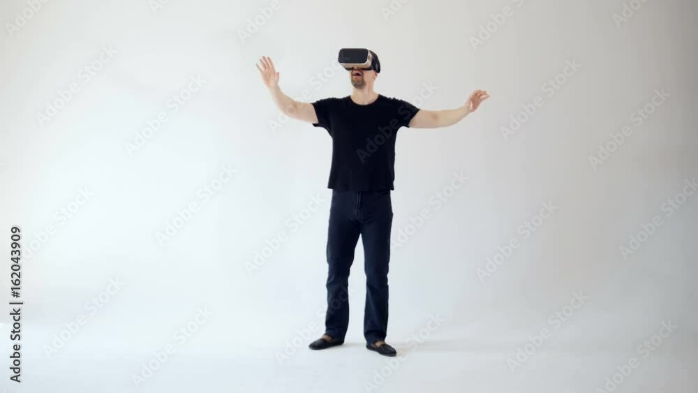 A young man is having fun with 3D glasses A young man is having fun with 3D glasses