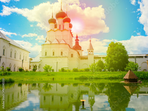 Reflection of church in pond in Rostov Kremlin, Yaroslavl region, Russia photo