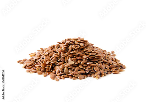 Flax seeds heap isolated on white