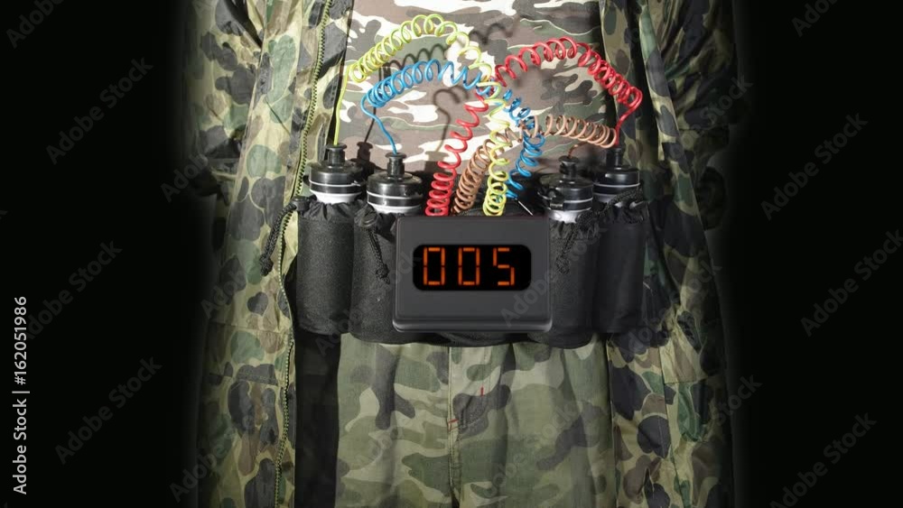 Midsection of suicide bomber with explosive belt and digital countdown timer clock