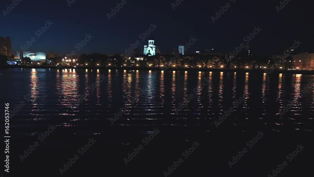 Panorama at night city in the summer. Embankment in Yekaterinburg Panorama at night city in the summer. Embankment in Yekaterinburg