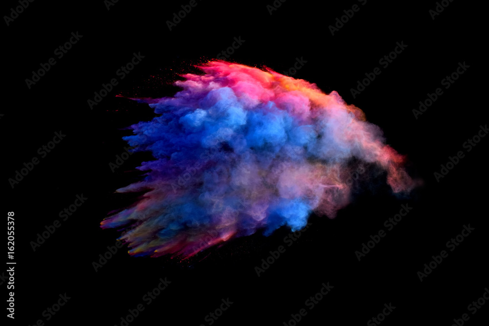 Bizarre forms of powder paint and flour combined  explode in front of a black background to give off fantastic colors and forms.