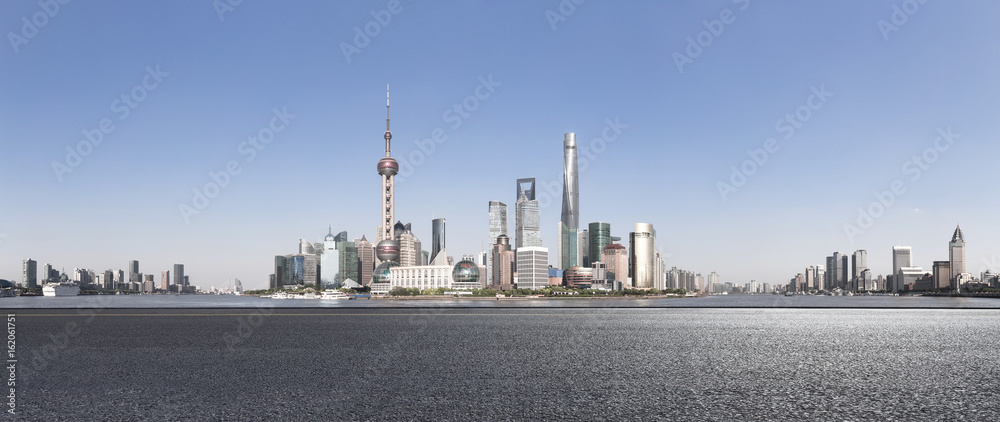 Empty road and modern cityscape of Shanghai