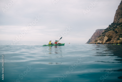in the sea on a kayak