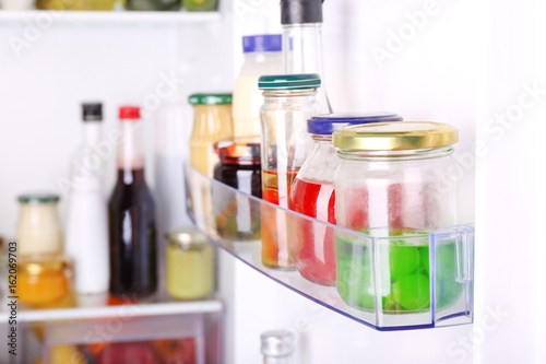 Many different sauces in fridge