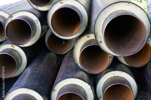 stack of metal pipes tubes with heater and pvc shell
