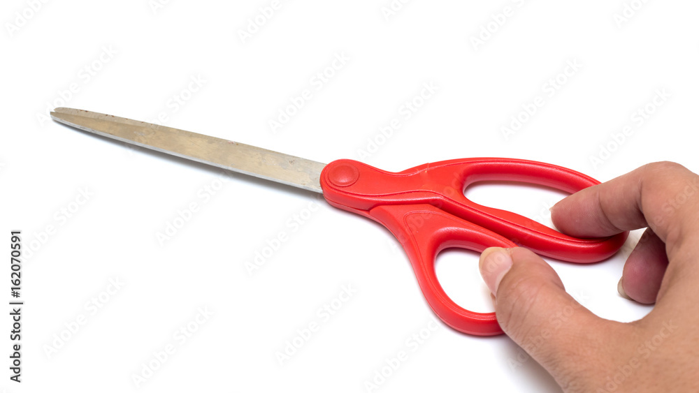 Scissors red Isolated on white background with hand Scissors red Isolated on white background with hand