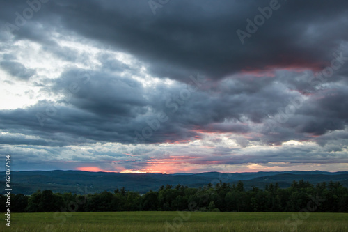 Dramatic Red Sunset Over Mountains © josephsjacobs