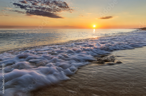 The coast of the Caspian Sea at sunset