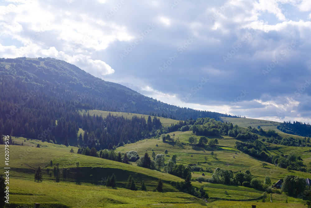 Beautiful sunny day is in mountain landscape. Carpathian, Ukraine.