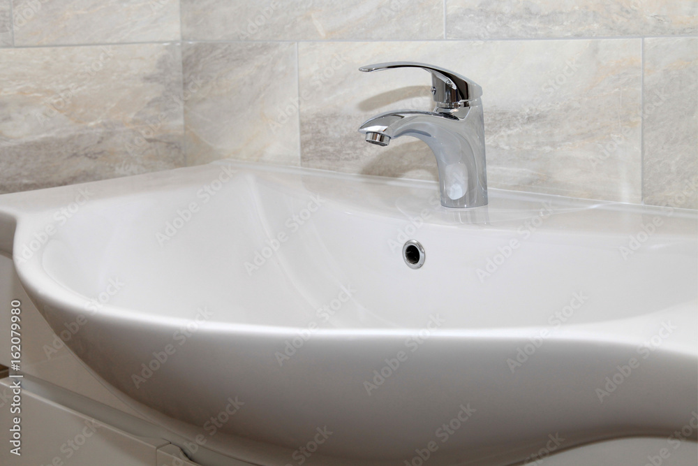 Bathroom interior with sink and faucet Bathroom interior with sink and faucet