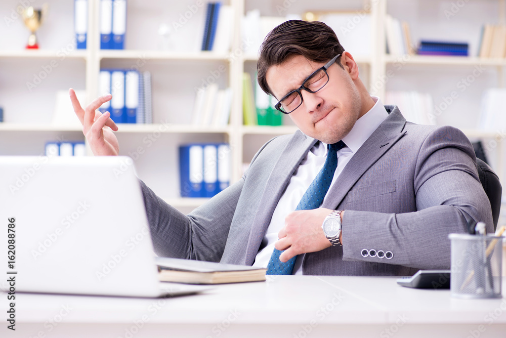 Businessman playing virtual guitar in office Businessman playing virtual guitar in office