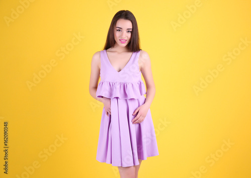 Beautiful young woman in li...