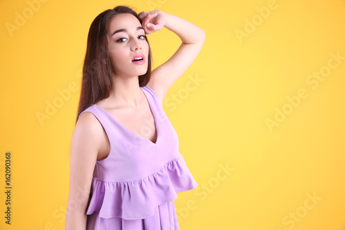 Beautiful young woman in li...