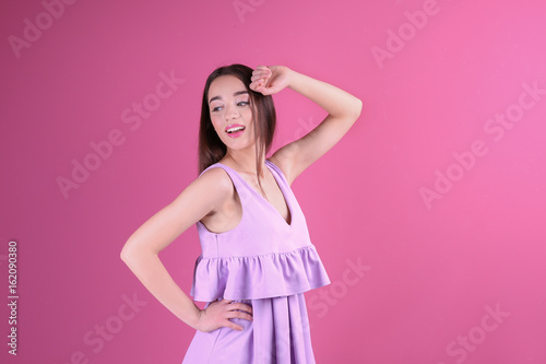 Beautiful young woman in li...