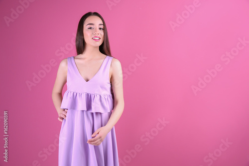 Beautiful young woman in li...