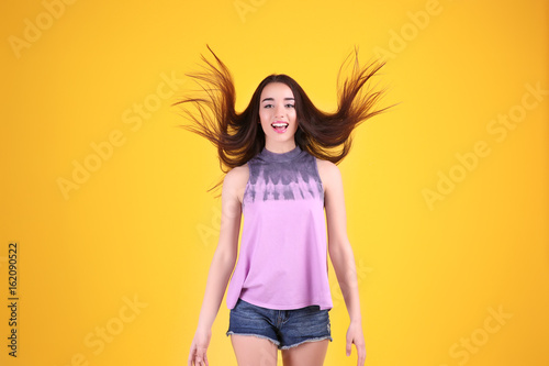 Beautiful young woman in li...