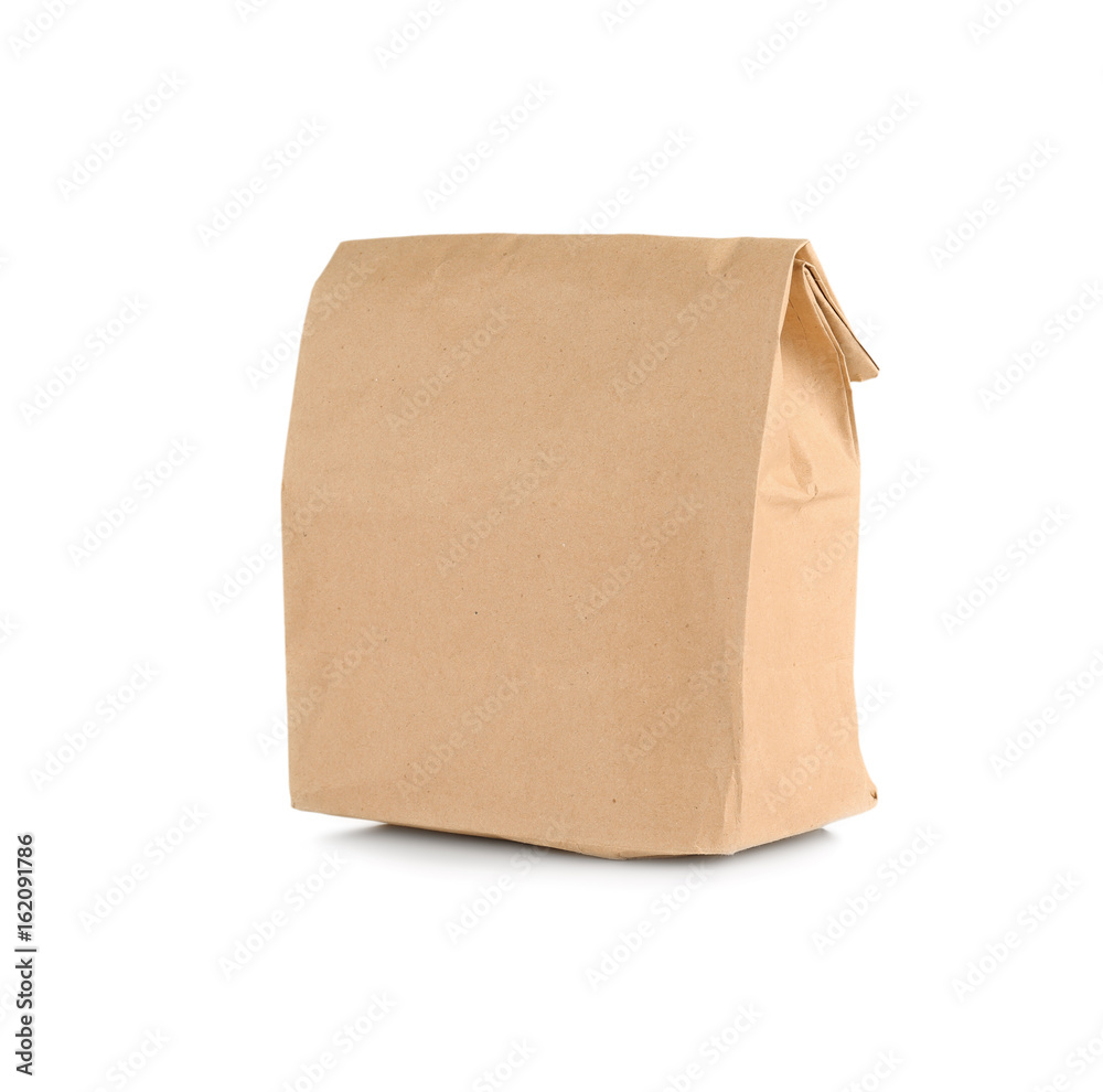 Paper bag with flour on white background Paper bag with flour on white background