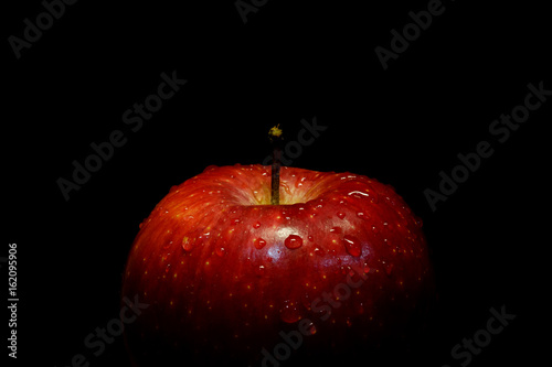 Red apple with black isolated background