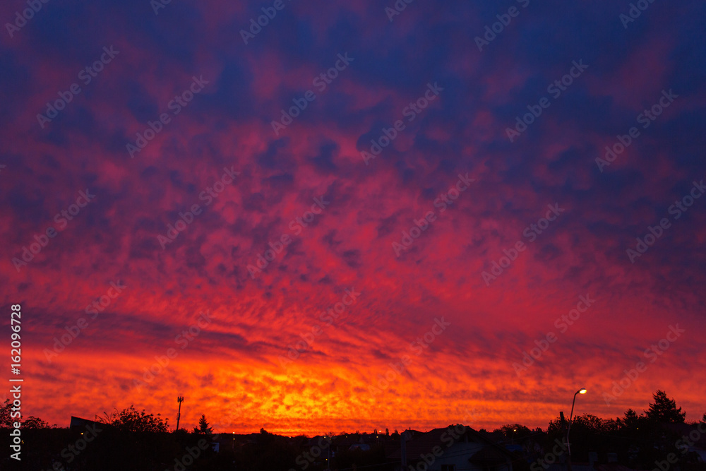 Dramatic red clouds at sunrise
