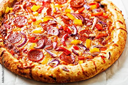 Barbecue pepperoni, red pepper and red onion pizza