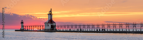 St. Joseph Lighthouses Sunset Panorama - Lake Michigan Coast at St. Joseph, Michigan photo