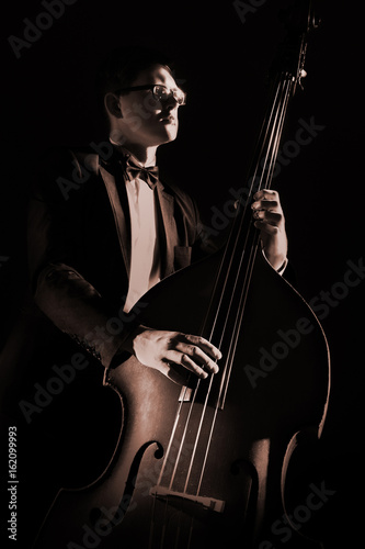Photography Double bass player playing contrabass