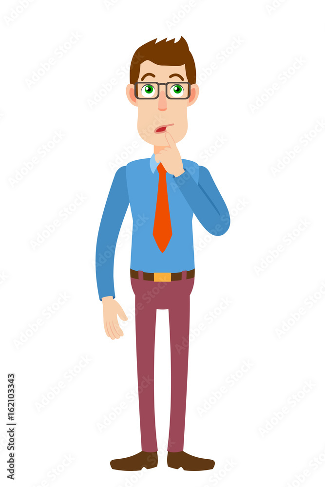 Businessman standing with his finger to his lips Businessman standing with his finger to his lips