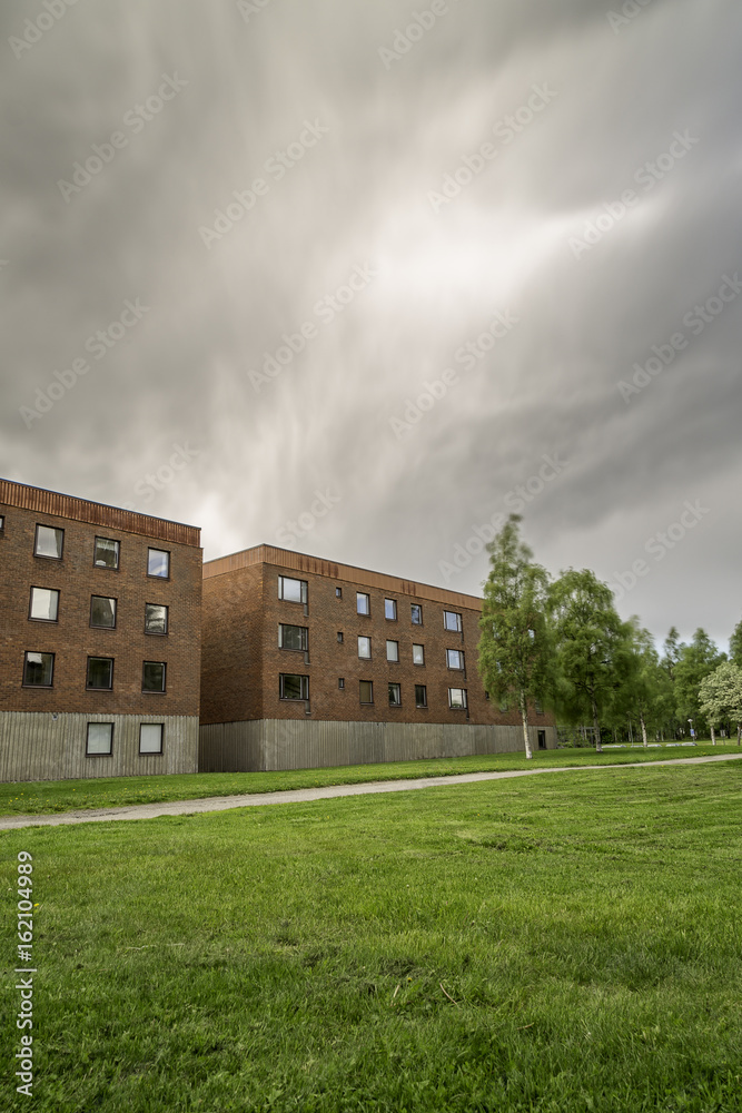 Student Apartments with a cloudy sky.