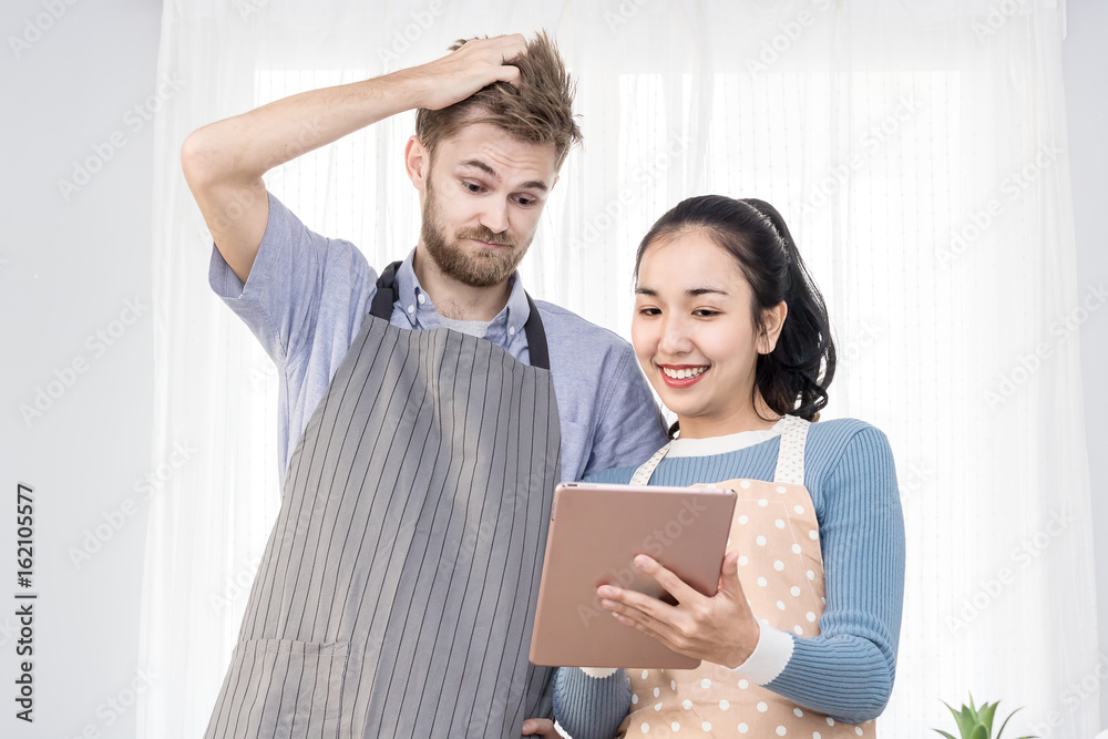 man and woman chef use tablet