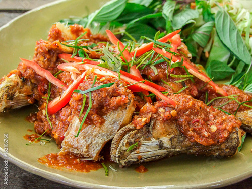 Deep fried fish in spicy sauce