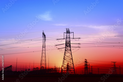 High piezoelectric towers  in the setting sun