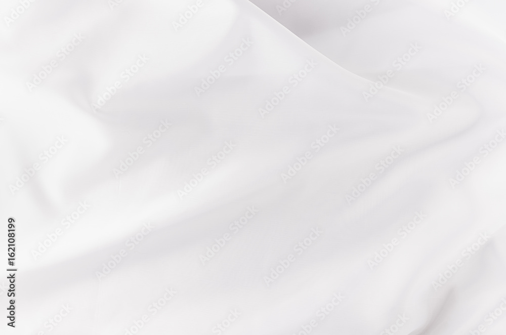 White smooth luxury silk or satin texture with liquid waves for wedding background.