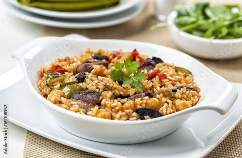 Arroz de pato. Rice with duck meat. Typical dish from Portugal. © hansgeel
