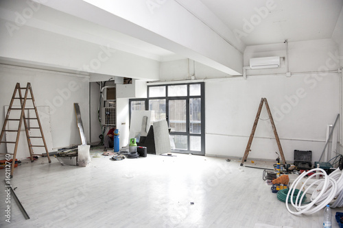 Construction works for the renovation of an office space and installing air conditioning.