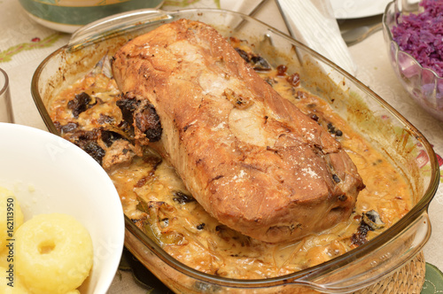 Delicious roast pork loin with plum for christmas dinner.