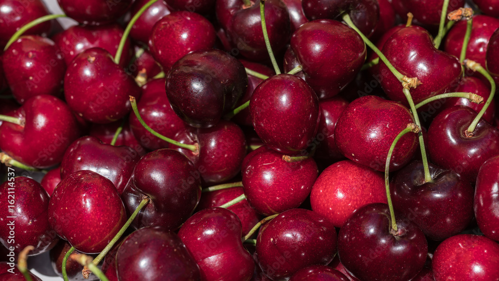 cherry detail macro of delicious fresh ripe red cherries with bright green stem, perfect food background Sweet cherry background. Cherry from Bolea Aragon Huesca Spain cherry detail macro of delicious fresh ripe red cherries with bright green stem, perfect food background Sweet cherry background. Cherry from Bolea Aragon Huesca Spain