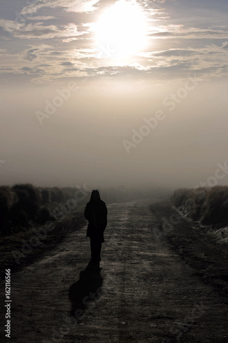 girl walking in the sunset (end of world) 