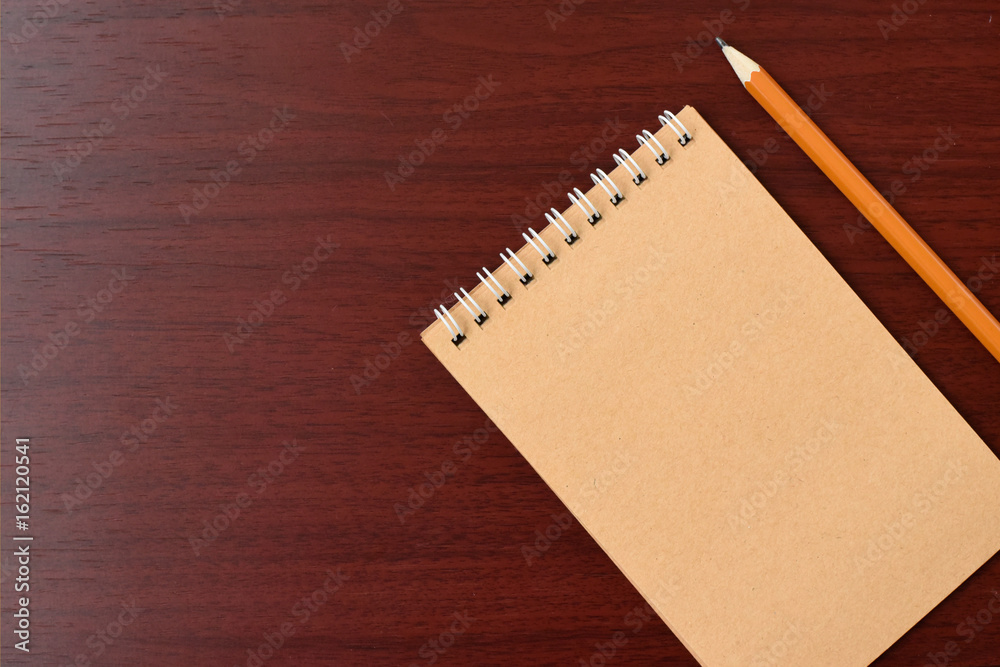 Top view of open spiral blank notebook with pencil on wood paper background. Open vintage notebook. Empty notebook paper for text with pencil . office concept top view.Copy space. Space for text.
Top view of open spiral blank notebook with pencil on wood paper background. Open vintage notebook. Empty notebook paper for text with pencil . office concept top view.Copy space. Space for text.