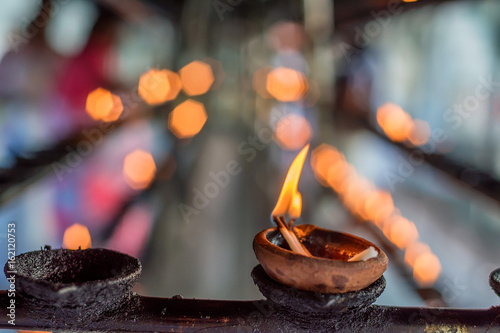 Coconut oil lamps in temple