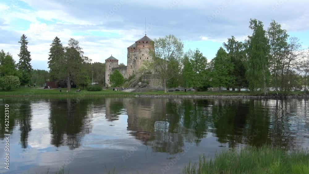 View of Olavinlinn's fortress on a summer evening. Finland, Savonlinna View of Olavinlinn's fortress on a summer evening. Finland, Savonlinna