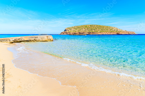 Beautiful sandy Cala Comte beach with turquoise sea water, Ibiza island, Spain