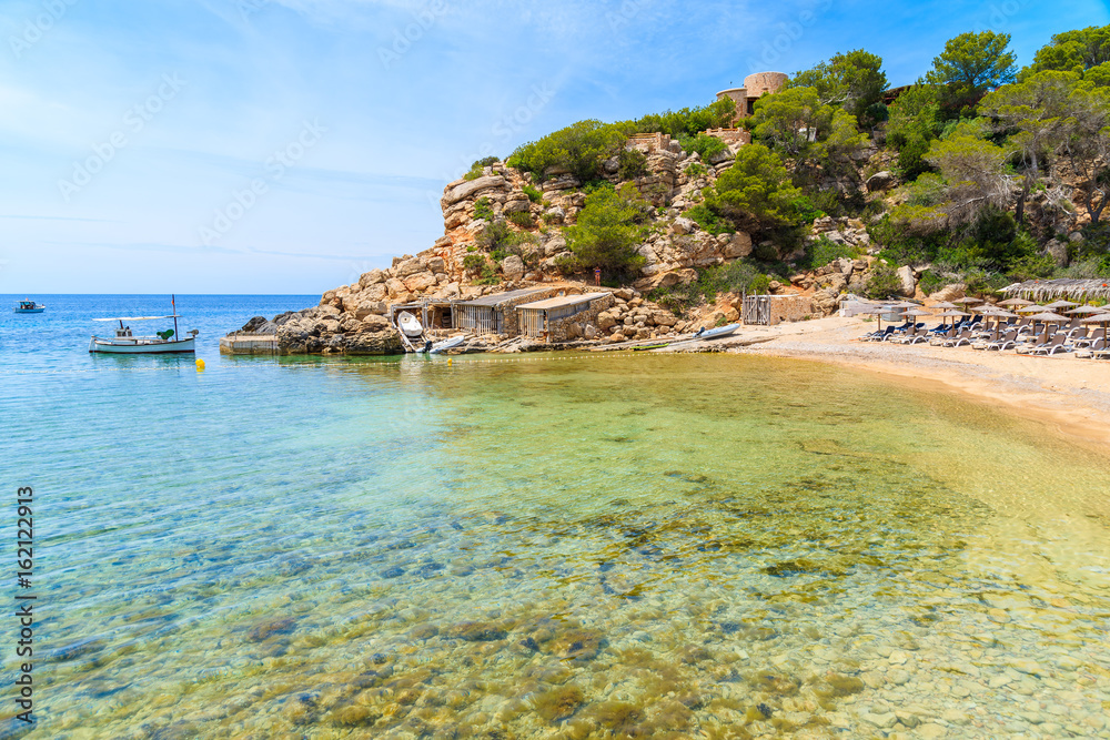 View of beautiful Cala Carbo bay with emerald green sea water, Ibiza island, Spain