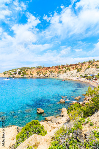 View of Cala d'Hort bay with beautiful azure blue sea water, Ibiza island, Spain © pkazmierczak