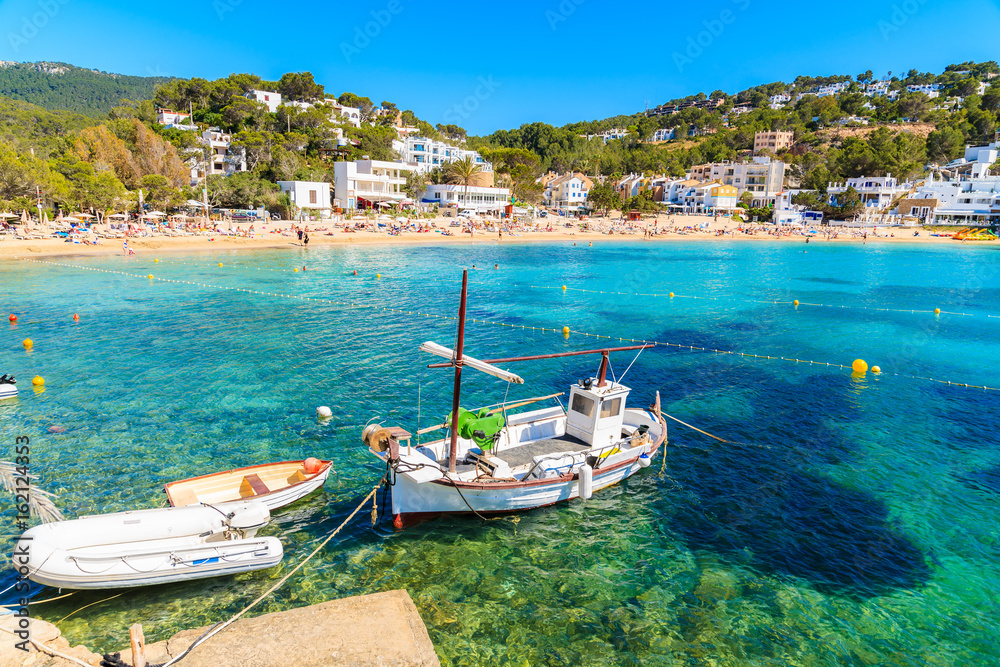 Fishing boat in Cala Vadella bay, Ibiza island, Spain